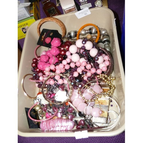 92 - A LARGE TUB OF COSTUME JEWELLERY BRACELETS AND NECKLACES