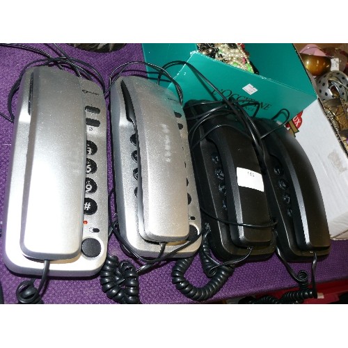 143 - A SET OF 4 GEEMARC PHONES