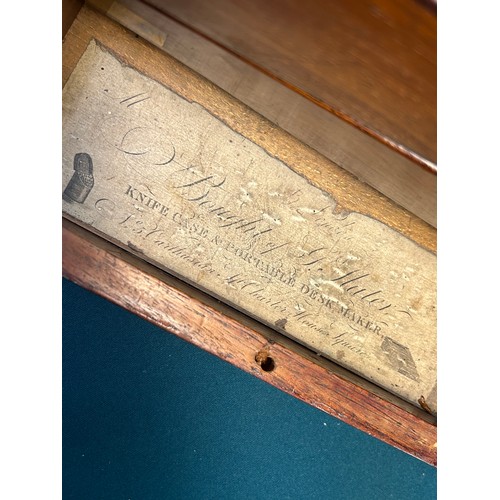 304 - An early 19th Century large mahogany Campaign Writing Slope with brass corners, recessed brass handl... 