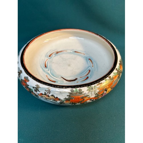 399 - A beautifully decorated early 20th Century Japanese Satsuma bowl on three feet with lake and mountai... 