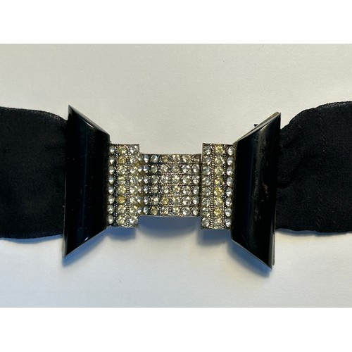 72 - A circa 1930 Art Deco ribbon belt, the clasp in black bakelite with diamante. Marked 