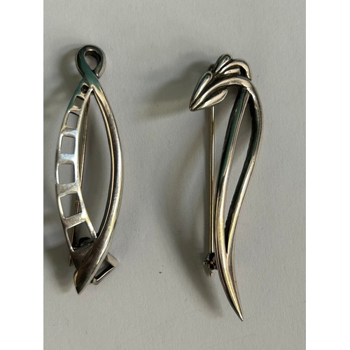 96 - 2 designer sterling silver brooches one of which is in the Art Nouveau style with flower heads