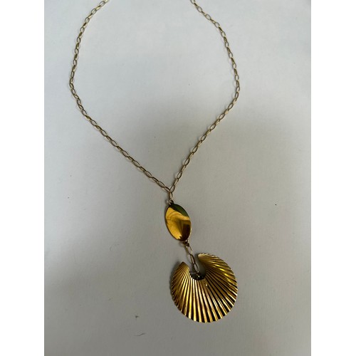 90 - A 9ct gold Egyptian style shell shape & oval necklace - 7.6 grams