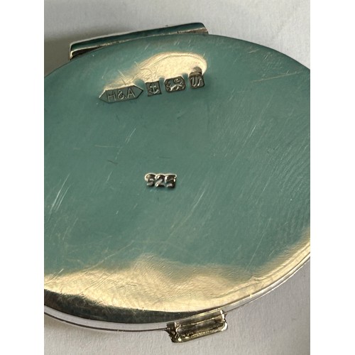 18 - A Sterling silver pill box with a hand enamelled painting of an otter on the lid with 