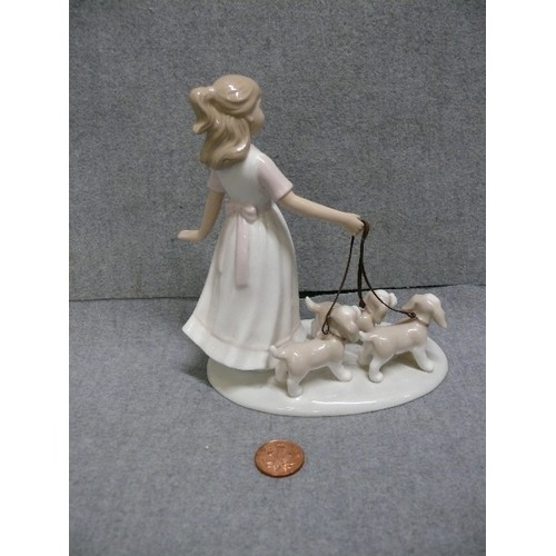 75 - LOVELY LEONARDO COLLECTION FIGURE, GIRL WALKING 3 HOUNDS ON LEADS.