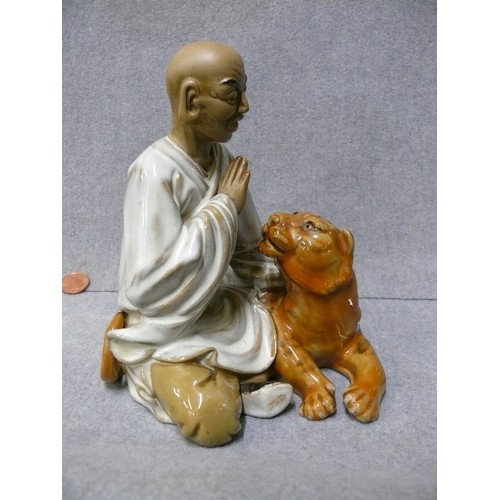 89 - LOVELY CERAMIC FIGURE OF BUDDHA WITH TIGER