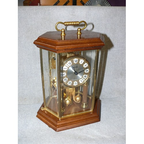 124 - CARRIAGE CLOCK 'KUNDO QUARTZ' IN ATTRACTIVE WOODEN AND GLASS CASE.