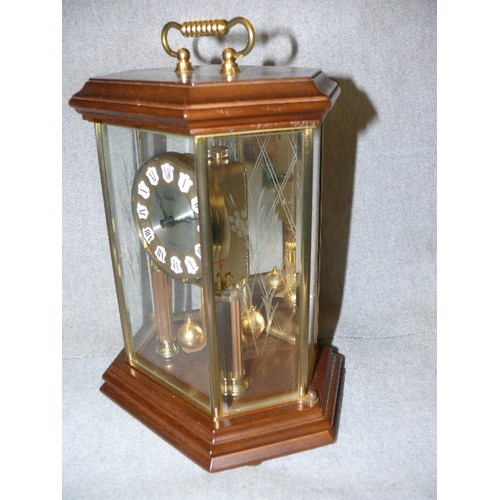 124 - CARRIAGE CLOCK 'KUNDO QUARTZ' IN ATTRACTIVE WOODEN AND GLASS CASE.