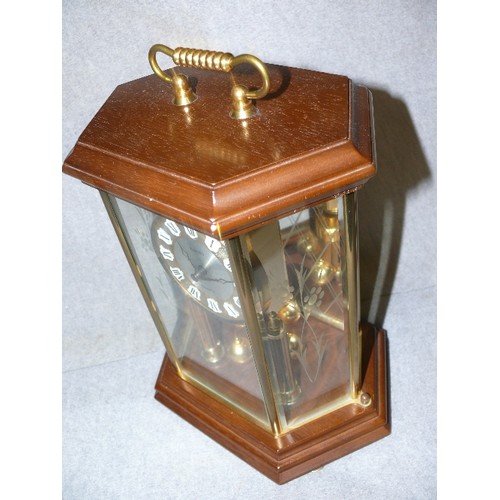 124 - CARRIAGE CLOCK 'KUNDO QUARTZ' IN ATTRACTIVE WOODEN AND GLASS CASE.