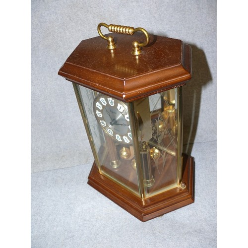 124 - CARRIAGE CLOCK 'KUNDO QUARTZ' IN ATTRACTIVE WOODEN AND GLASS CASE.