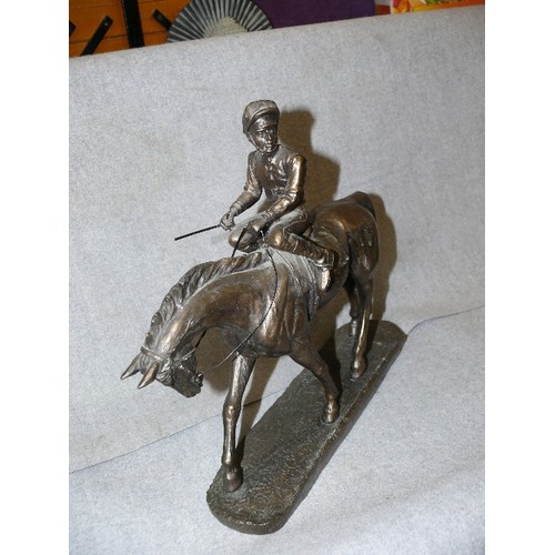 126 - JOCKEY & RACEHORSE. ANTIQUED BRONZE EFFECT FIGURE, RESIN.