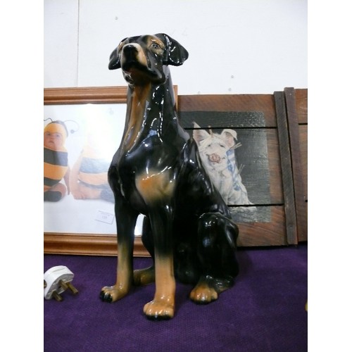 138 - LARGE CERAMIC DOBERMAN DOG.