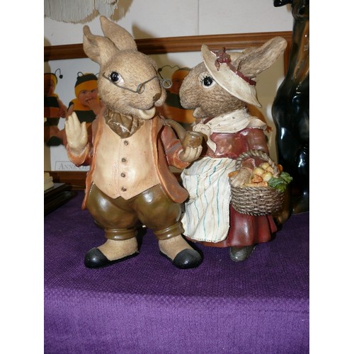 139 - MR & MRS RABBIT. LARGE RESIN FIGURES COMPLETE WITH SPECS AND HATS ETC.