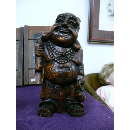 140 - LAUGHING BUDDHA WITH GIFTS. RESIN