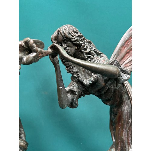 269 - A stunning pair of solid bronze figures of fairies with flower trumpets, standing on toad stools sur... 