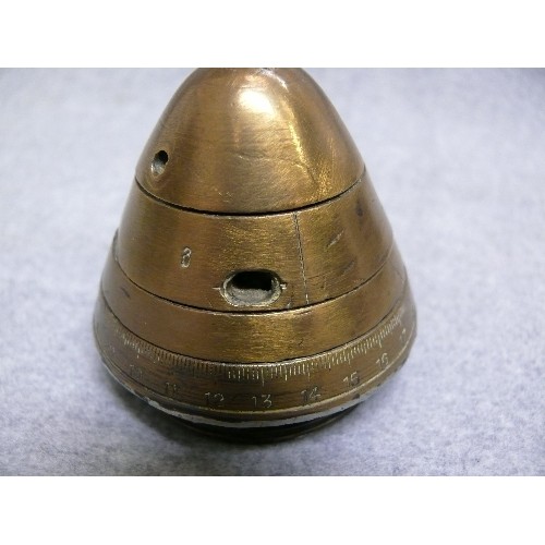 9 - A SOLID BRASS BRITISH FUSE SHELL. The time and percussion fuze N°80 was the fuze usually used with t... 