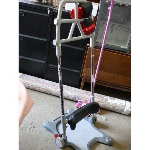 433A - MOLIFT RAISER PRO BY ETAC, A MOBILITY AID THAT THE INFIRMED STAND ON AND IS PUSHED AROUND