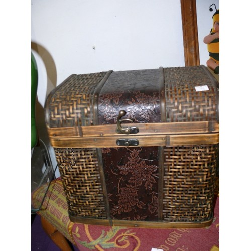 143 - RATTAN CHEST WITH HINGED LID & EMBOSSED DETAIL.