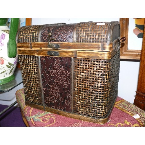 143 - RATTAN CHEST WITH HINGED LID & EMBOSSED DETAIL.