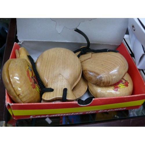 319 - 4 BOXED SETS OF WOODEN CASTANETS