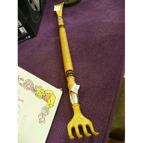 331 - MINIATURE BISQUE DOLL AND A BACK SCRATCHER SHOE HORN