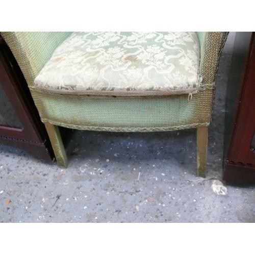 400 - LLOYD LOOM GREEN COMMODE CHAIR (DECORATED WITH A PLANT)