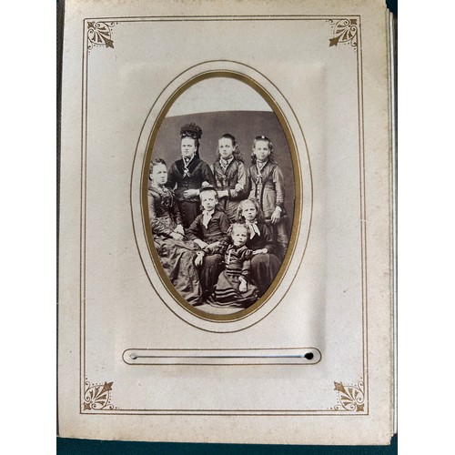 166 - A Victorian Carte De Visite photograph album with 30 original photographs - many Peterborough photog... 