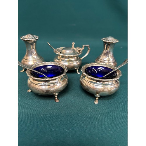 132 - A Sterling Silver 5 piece condiment set Sheffield 1909, Atkin Brothers. Georgian style on pad feet. ... 