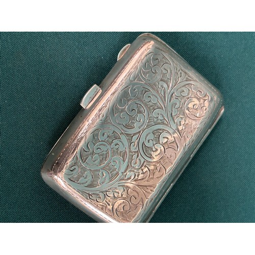 136D - Sterling Silver Cigarette Case, with engraved foliate scroll design, diamond cartouche with 