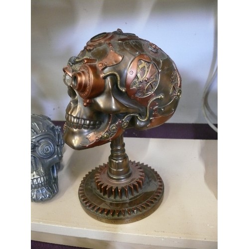 63 - 2 STEAMPUNK SKULLS, ONE WITH WORKING LIGHT