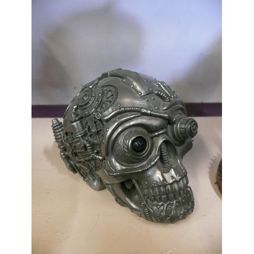 63 - 2 STEAMPUNK SKULLS, ONE WITH WORKING LIGHT