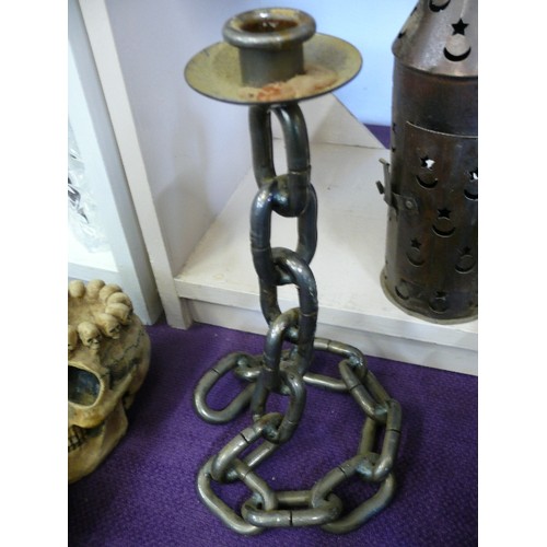 64 - A METAL CHAIN EFFECT CANDLE HOLDER PLUS A CANDLE LANTERN WITH SUNS AND MOONS
