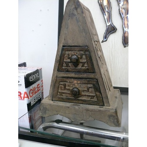 128 - A WOODEN SET OF PYRAMID DRAWERS WITH AZTEC DESIGN