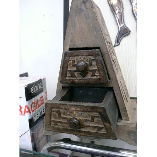 128 - A WOODEN SET OF PYRAMID DRAWERS WITH AZTEC DESIGN