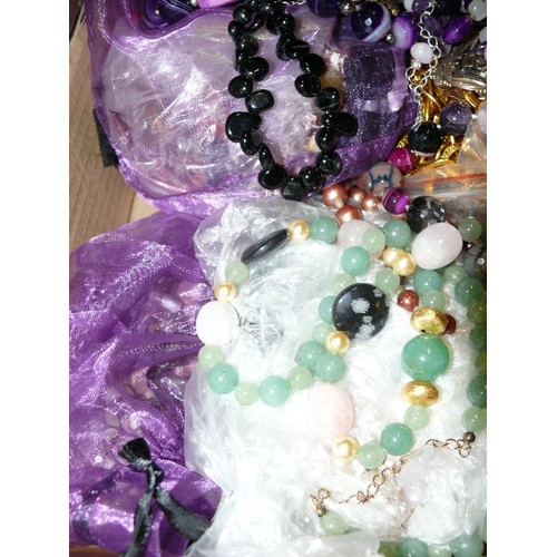 155 - A LARGE COLLECTION OF BEAD AND GEMSTONE JEWELLERY