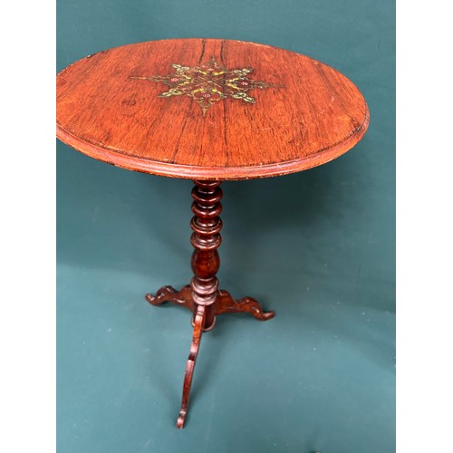 455 - A 19th Century rosewood lamp or wine table with brass inlay work to the top, turned column with trip... 