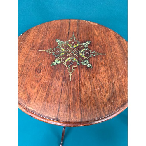 455 - A 19th Century rosewood lamp or wine table with brass inlay work to the top, turned column with trip... 