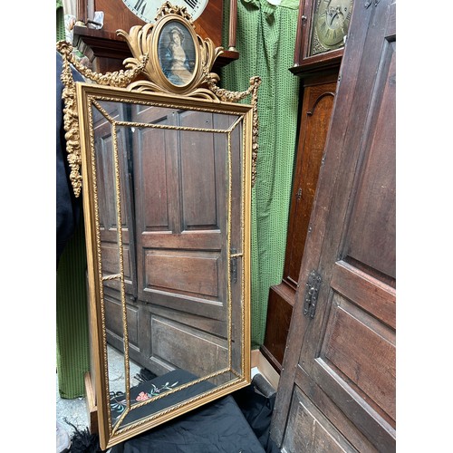 448 - Large 20th Century reproduction gilt pier wall mirror, the top with oval framed silk print of Madame... 