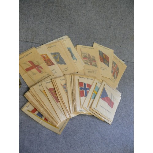 27 - A COLLECTION OF ABOUT 200 CIGARETTE SILKS CARDS OF BRITISH EMPIRE FLAGS AND NATIONAL FLAGS BY KENSIT... 