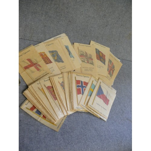 27 - A COLLECTION OF ABOUT 200 CIGARETTE SILKS CARDS OF BRITISH EMPIRE FLAGS AND NATIONAL FLAGS BY KENSIT... 