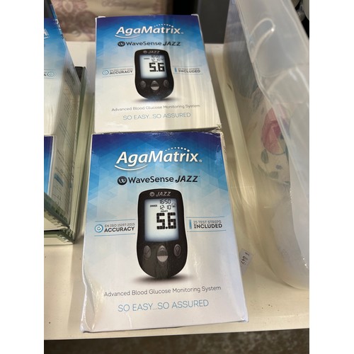 472A - 2 x boxes blood glucose monitoring systems by AgaMatrix