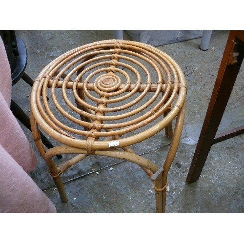 555 - CANE STOOL AND A CANE MAGAZINE RACK