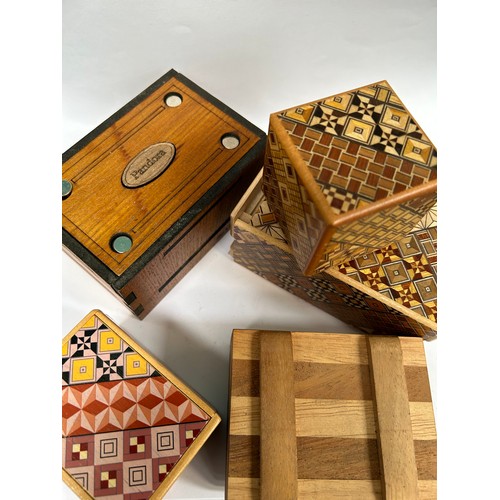 306A - 5 x wooden puzzle boxes, 3 with parquetry inlay