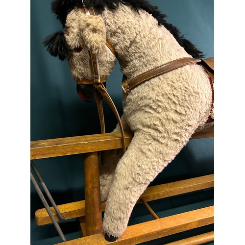 230A - A mid century rocking horse on a wooden safety rocker, plush fabric with horse hair tail -120cm x 80... 