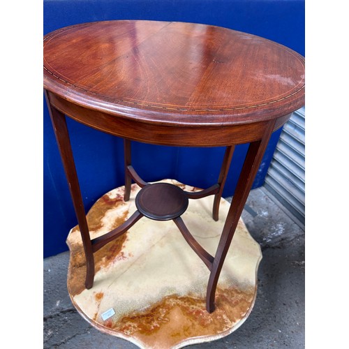 459 - An Edwardian mahogany circular occasional table, the top with boxwood and ebony stringing. 60cm dia