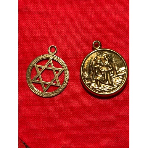 81A - A 9ct gold Star of David pendant and a 9ct gold St Christopher pendant.  1.6 grams