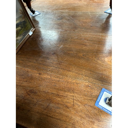 425 - Victorian mahogany wind out dining table on turned legs and original brown pot castors - with a leaf... 