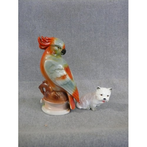 237 - A VINTAGE FINE PORCELAIN PARROT FIGURINE HAT PIN HOLDER PLUS A PORCELAIN CAIRN TERRIER FIGURINE