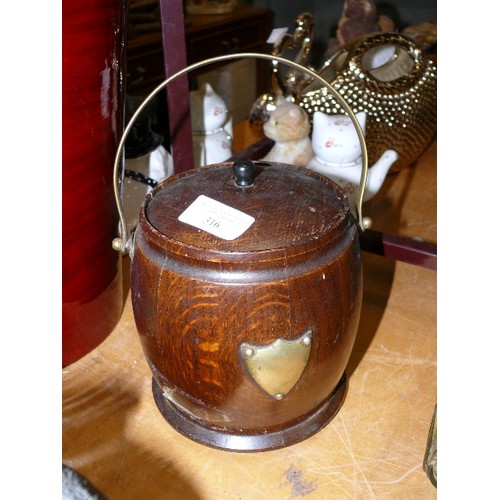 316 - A VINTAGE WOODEN TEA CADDY WITH BRASS DETAIL AND CERAMIC LINER