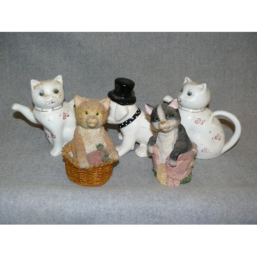 319 - A COLLECTION OF DECORATIVE CAT TEAPOTS  AND DOGS